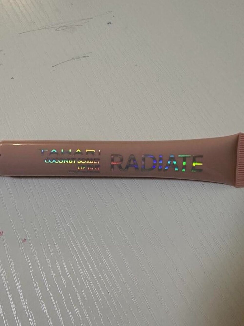 Coconut, sorbet, lip, tint Radiate Tahari